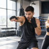 Boxing training with gloves and focus mitts